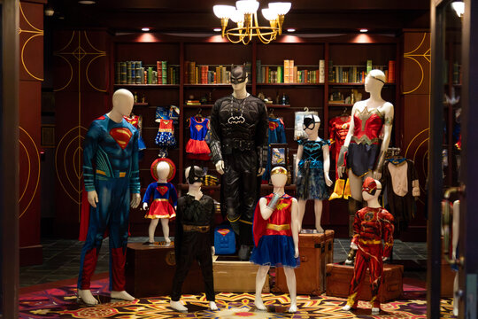 Abu Dhabi, UAE - April 24, 2024: Display of superhero costumes at the store, mannequins dressed as popular DC Comics characters like Superman, Batman, Wonder Woman, and The Flash