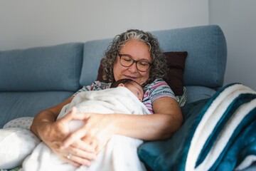 Tender Moment Between Grandma and Baby
