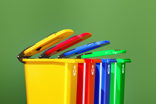 Color-coded recycling bins. Waste disposal concept.