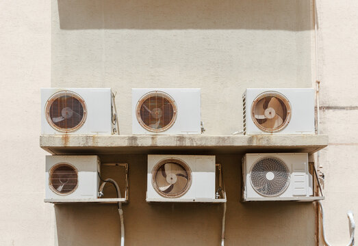 Ventilation system installed on building wall.