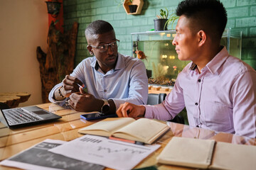 Young latin couple sharing ideas