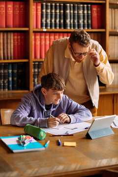 Professor supervising student 