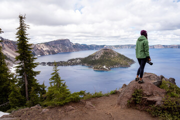 Woman gazing the landscape of Crater Lake