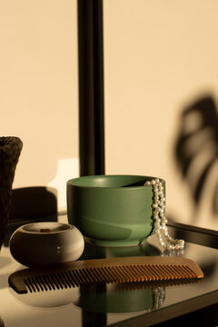 Objects on the shelf illuminated with sunlight