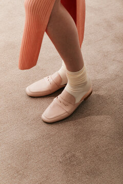Woman legs in stylish shoes