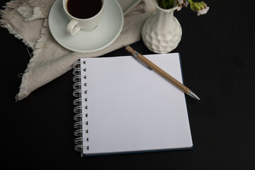 Little white Coffee cup and notepad morning planning