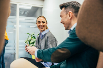 Office colleagues interacting with positive dynamics
