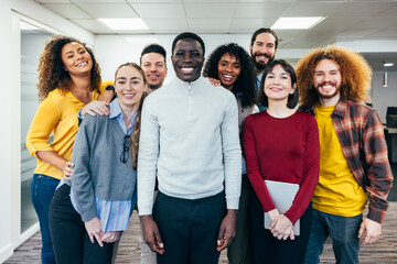 Diverse team of professionals smiling in an office setting