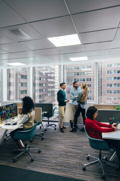 Modern corporate office with active employees