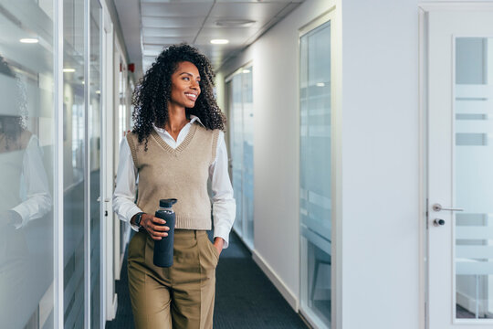 Confident businesswoman in contemporary office setting