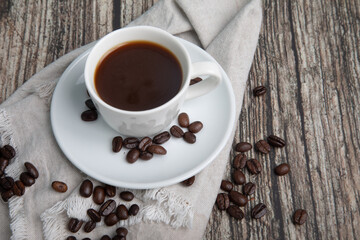 Little white Cup of black expresso coffee