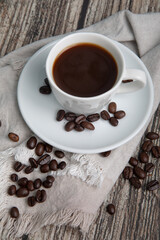 Little white Cup of black expresso coffee