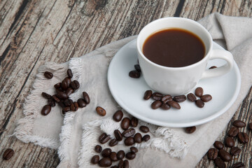 Little white Cup of black expresso coffee