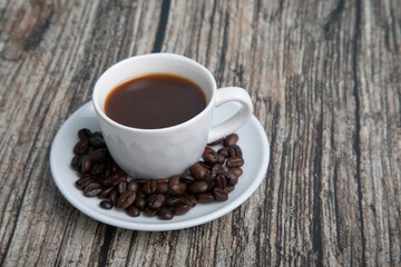 Little white Cup of black expresso coffee