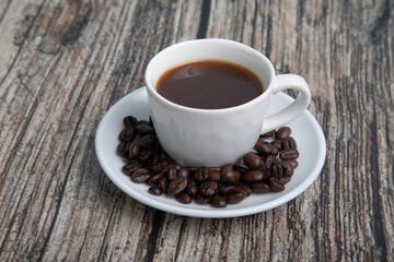 Little white Cup of black expresso coffee