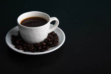 Little white Cup of black expresso coffee