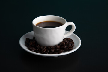 Little white Cup of black expresso coffee