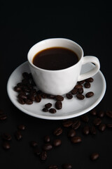 Little white Cup of black expresso coffee