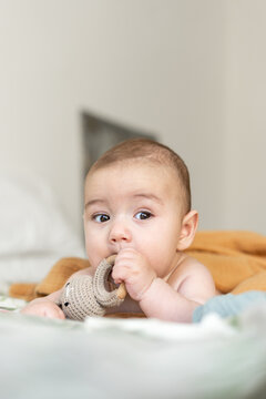 baby with teether 