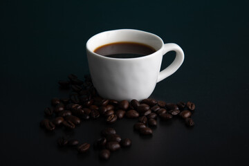 Little white Cup of black expresso coffee