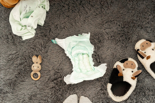 real and authentic scene baby changing diaper 