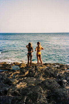 Two girls beach back