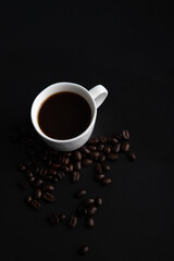 Little white Cup of black expresso coffee