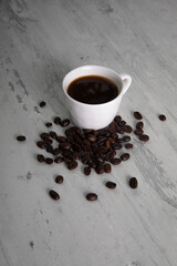 Little white Cup of black expresso coffee