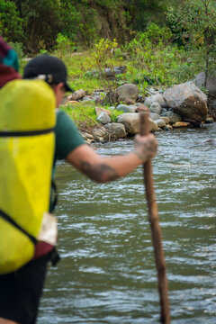 Man walking in the river