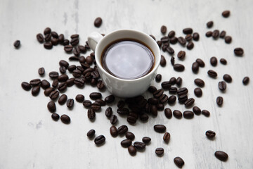 Little white Cup of black expresso coffee