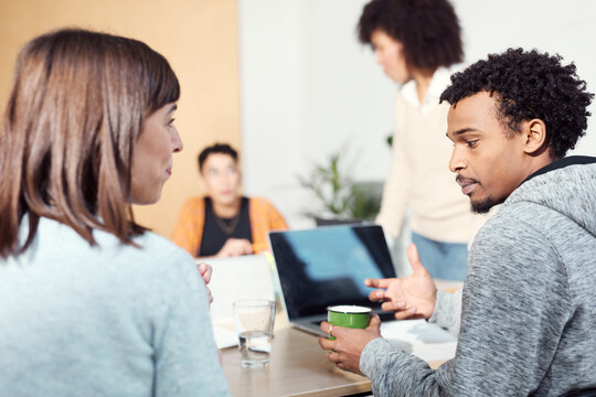  Team Discussion at business office