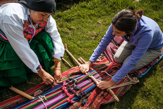 tourist learning traditional peruvian culture