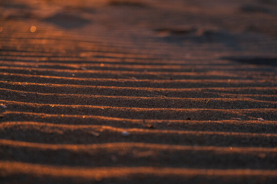 Texture of sand waves on beach.