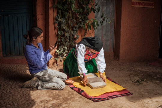 travel woman capturing the moment with her cell phone