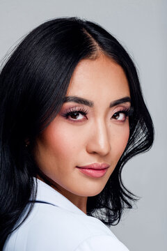 Sophisticated Gaze of Feminine Model Wearing Business Attire