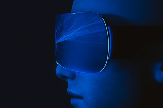 Man engaged in virtual reality experience at night