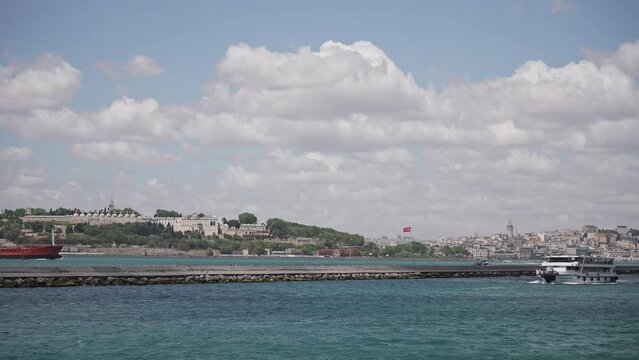 Ships, ferries, boats, historical buildings in the Bosphorus, Istanbul, Turkiye