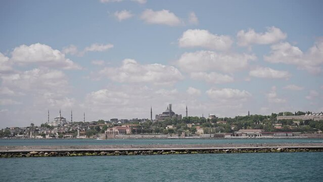 Ships, ferries, boats, historical buildings in the Bosphorus, Istanbul, Turkiye