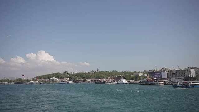 Ships, ferries, boats, historical buildings in the Bosphorus, Istanbul, Turkiye