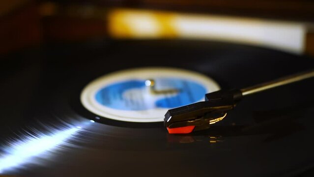 old gramophone spinning vinyl record - vintage music player