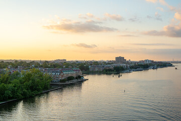 An elevated view of historic Old Town Alexandria Virginia and the Potomac River at sunset.