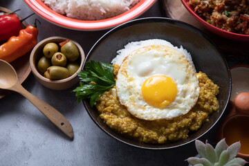 Quinua quinoa stew with cheese and fried egg peru peruvian andean food