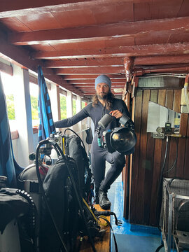 Diver holds underwater video equipment