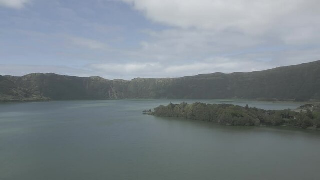 The stunning sete cidades volcanic crater lake surrounded by lush greenery, aerial view