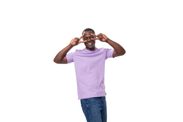 Fototapeta premium young authentic slender american guy dressed in light lilac t-shirt and jeans