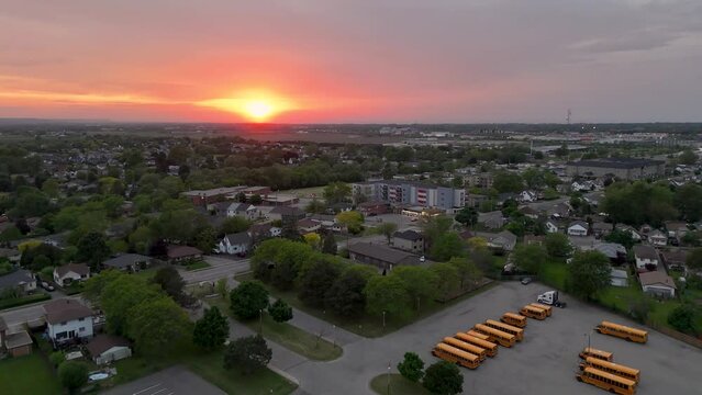 Drone shot flying over residential area of St. Catharines Ontario in Spring