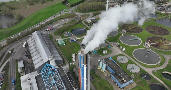 Smoke , smokestack coming from a waste incineration installation in Duiven, teh Netherlands. Waste processing, new energy from waste.