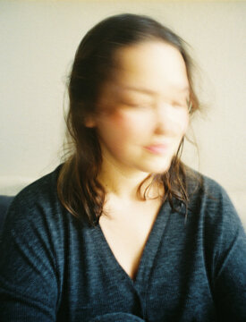 Blurred Portrait of a woman in Soft Indoor Light