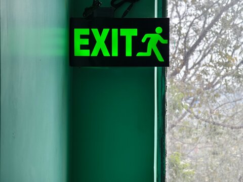 Exit sign written in a building