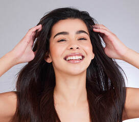 Studio, hair care and woman in portrait with hands, keratin treatment or clear skin on white...